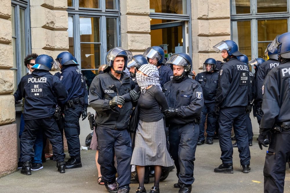 Berlin Police Officer Fined for Assaulting Journalist During Protest Eviction