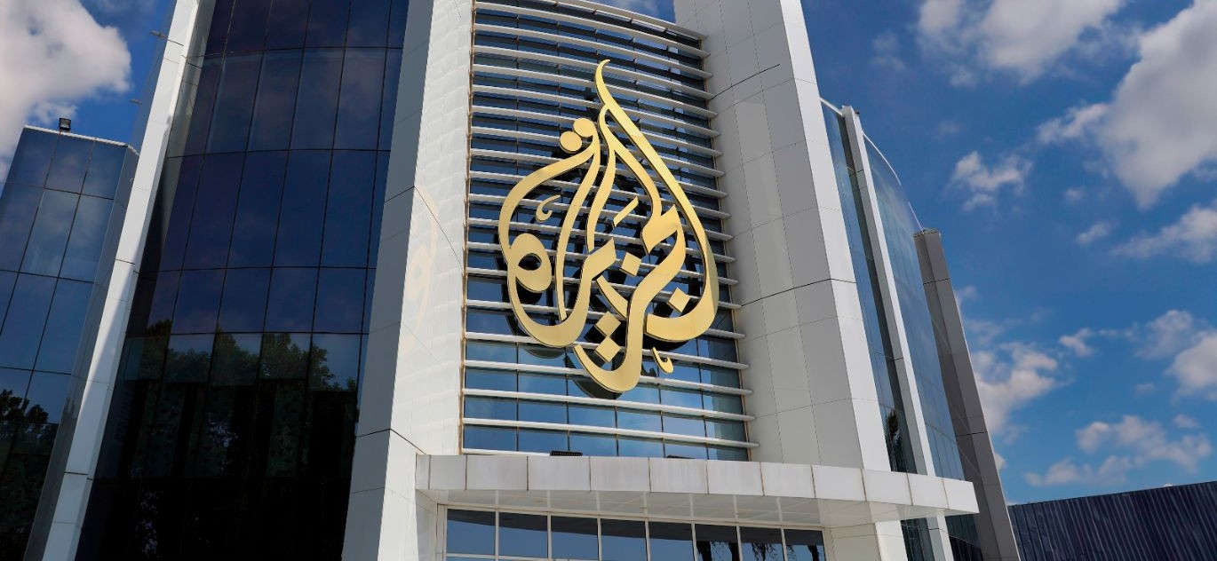 AJA Building with Clouds (1) (1)