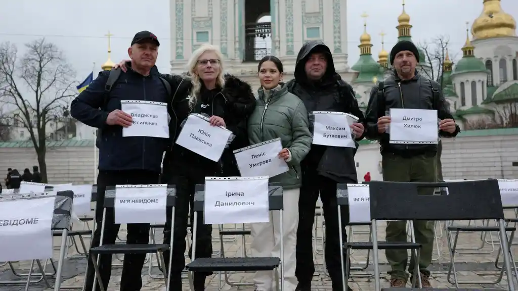Empty chairs speak for missing voices in Kyiv